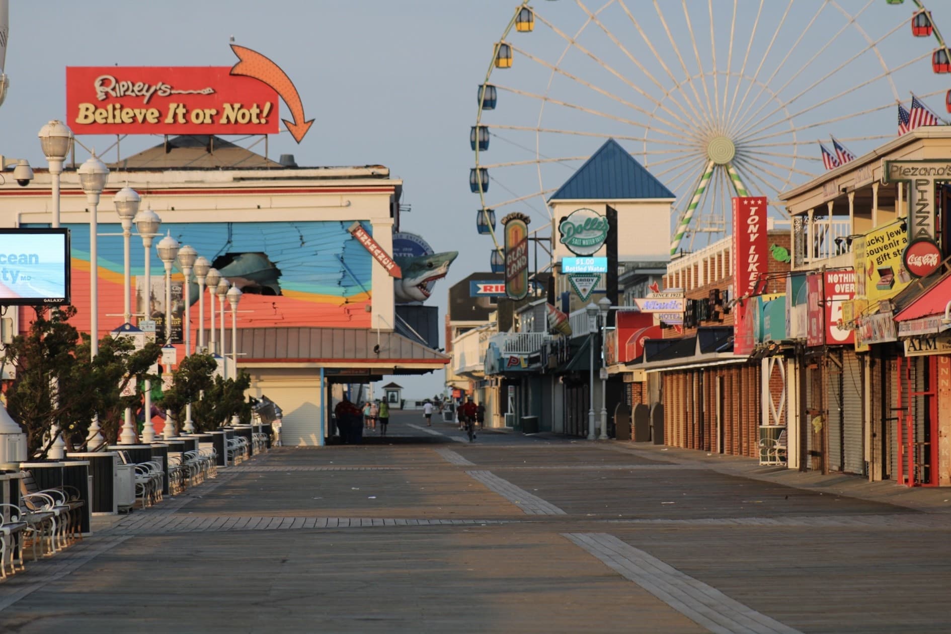 A colorful scene of the OC boardwalk early in the morning.