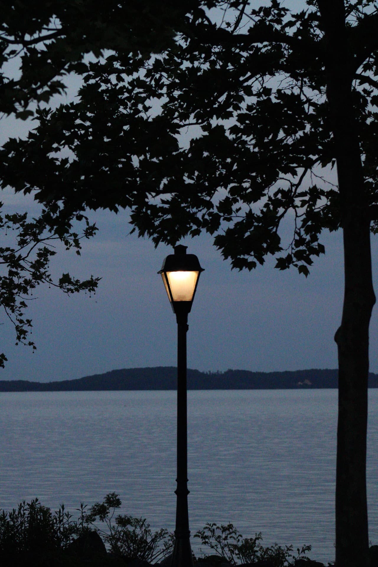 One of the lamps along the Promenade walkway at night in Havre de Grace.