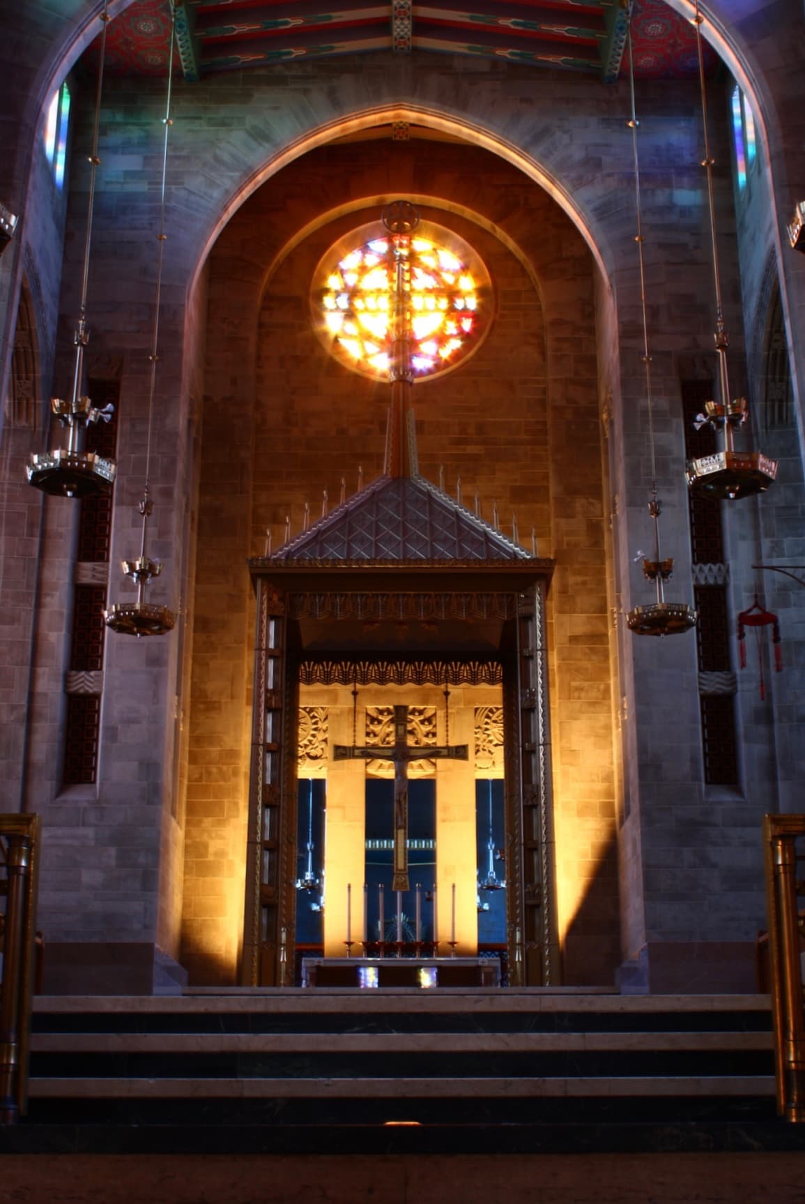 Mary our Queen Cathedral when the sun is shining through the stain glass illuminating the church.